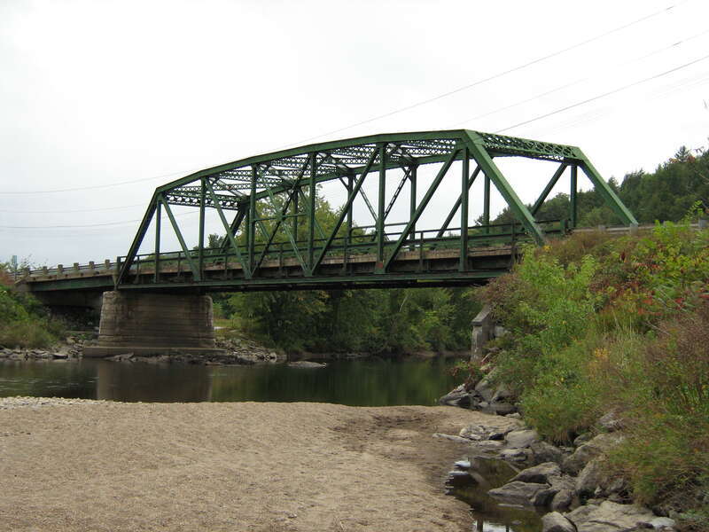 Jeffersonville Bridge, Cambridge, Vermont. ﻿Through truss bridge spanning Lamoille River on Route 108. Built by American Bridge Company.