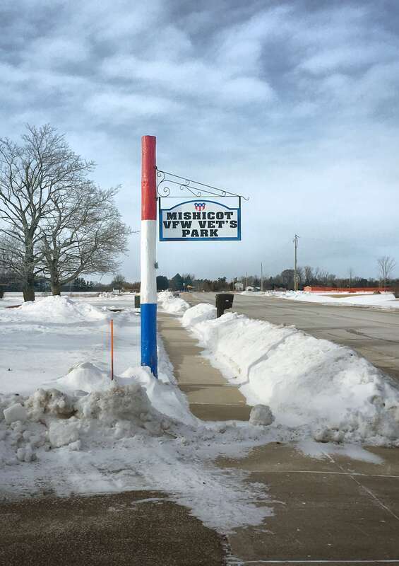 A sign for the Mishicot VFW Vet's Park on Main Street (Highway 147) at the edge of Mishicot, WI. This image appears in the January 24th edition of the Herald Times Reporter.