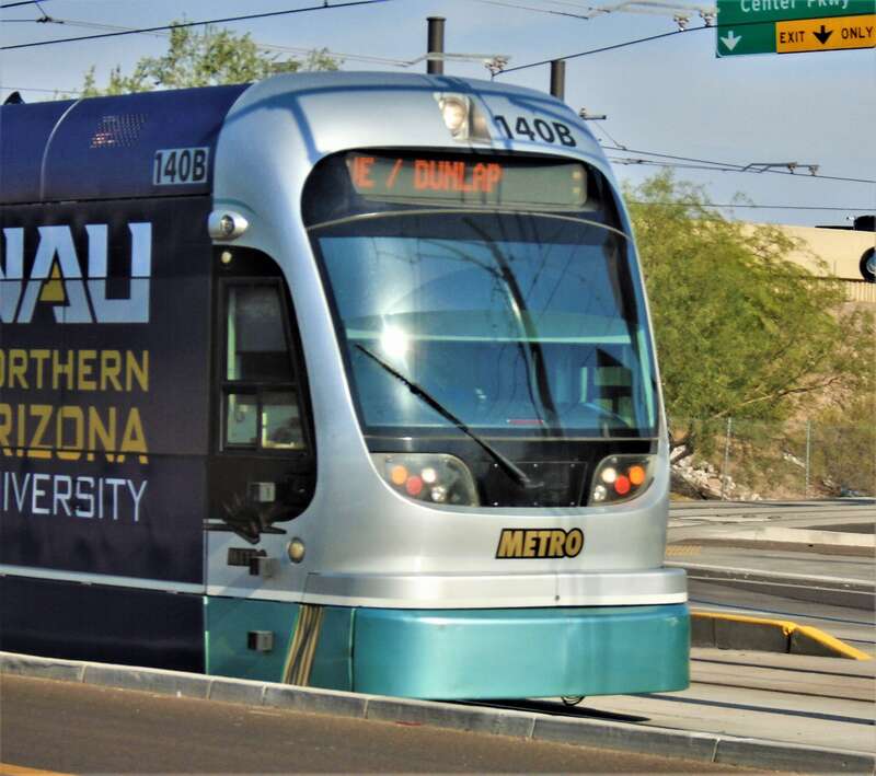 The cab of a Valley Metro Rail train on East Washington Street between North 54th Place and North 48th Street, across from Tovrea Castle.