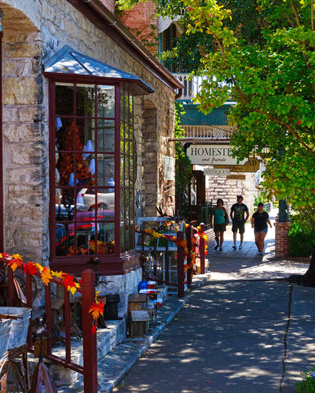 Window shoppers in downtown Fredericksburg, TX