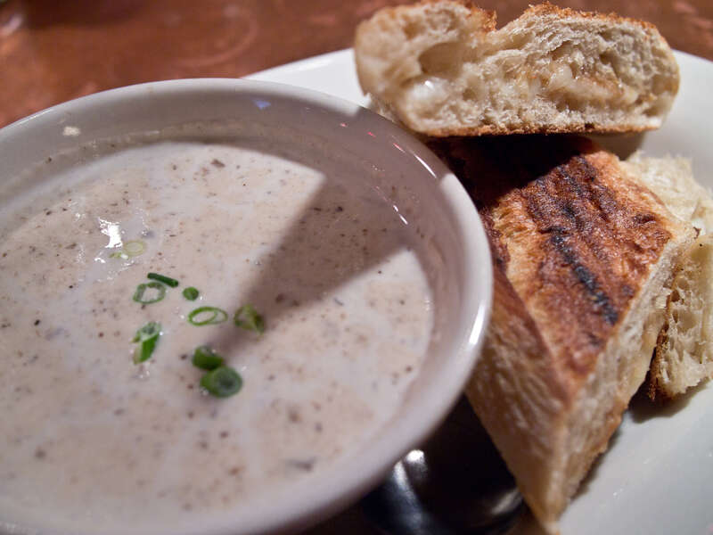 Goats milk cheddar with roasted garlic spread on rustic batard served with creamy wild mushroom soup

Menu PDF