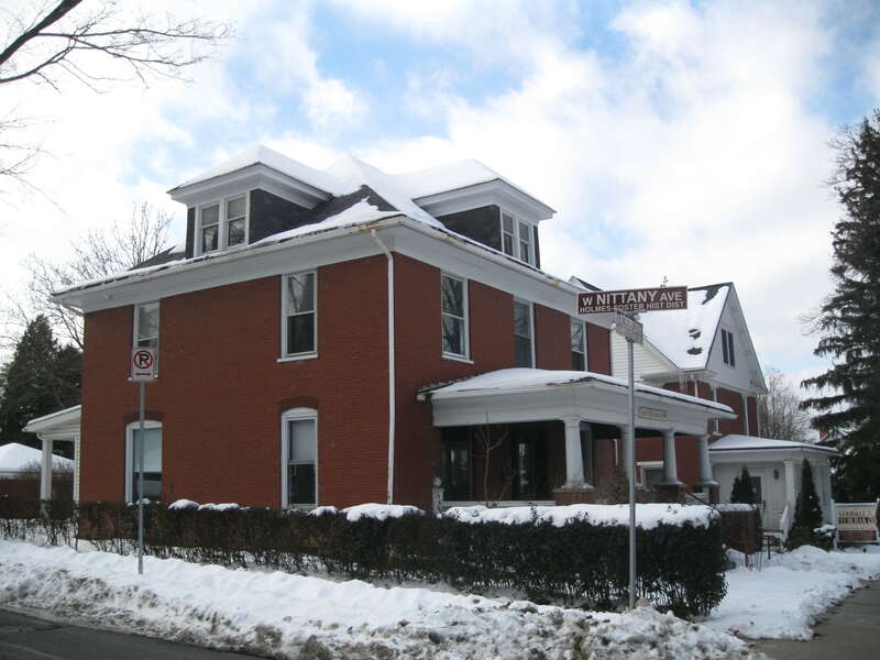 Houses at West Nittany Avenue and South Atherton Street in the Holmes-Foster-Highlands Historic District in the borough of State College, Centre County, Pennsylvania, USA. The district was added to the NRHP in 1995.
