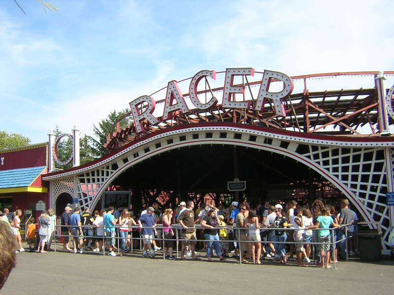 A scene from Kennywood, an amusement park located in West Mifflin, Pennsylvania on the Monongahela River.
This is a view of the Racer, a wooden roller coaster. It is a racing,  moebius loop coaster; one of only three in the world. The current Racer