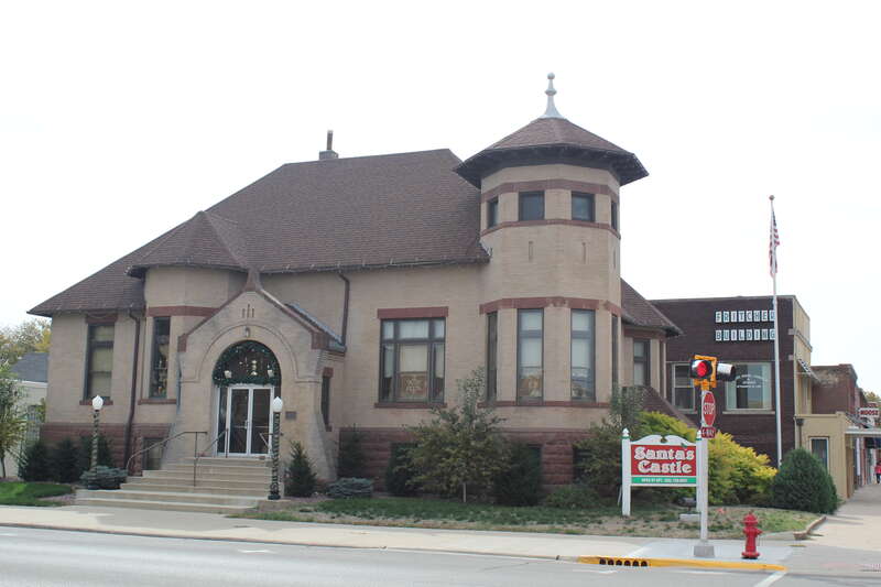 This is the former Storm Lake Public Library building, a Carnegie library. The Storm Lake Public Library has relocated to a new building. This building is currently being used for Santa's Castle.