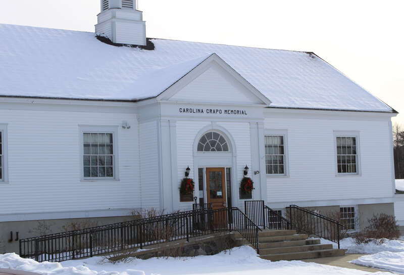 The Carolina Crapo Memorial building in Sugar Hill, New Hampshire which holds the Town Offices, Library and Police Department.