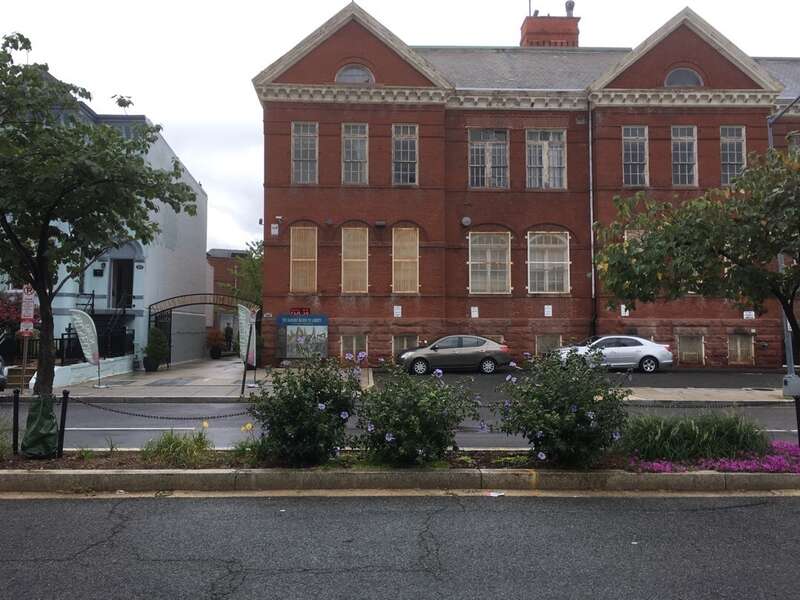 A red brick building with an alley way next to it which leads to the African American Civil War History Museum
The African American Civil War History Museum is across the street from theAfrican-American Civil War Memorial
Keywords: nps; national park