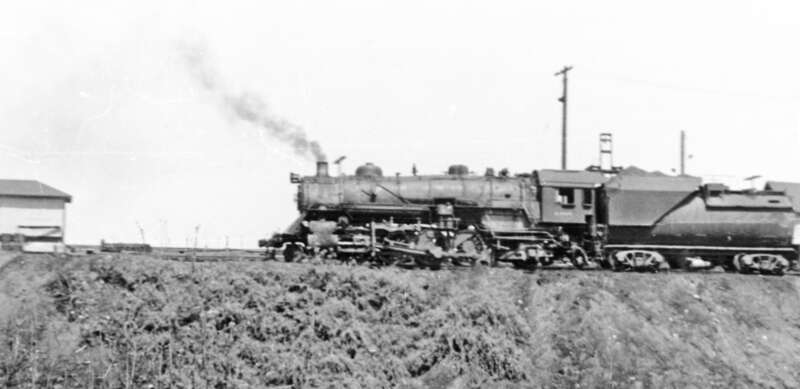 Glimpsed from my passing train, a Baltimore &amp;amp; Ohio 2-8-4 is switching in the Yards at Washington D.C. In 1952 the B&amp;amp;O were still using quite a number of steam locomotives.
