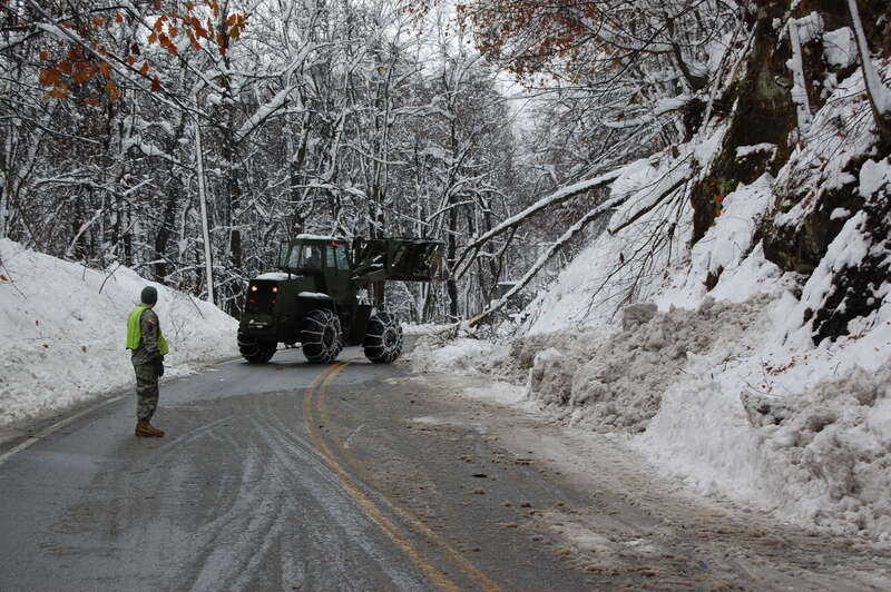 Soldiers of the West Virginia Army National Guard assigned to 821st Engineering Company from Summersville, W.Va. assist in debris and snow cleanup after Hurricane Sandy in Nicholas County.  

The estimated two feet of snow caused havoc throughout the