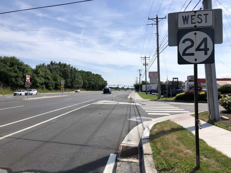 View west along Delaware State Route 24 and north along Delaware State Route 1D (John J Williams Highway) at Delaware State Route 1 (Coastal Highway) in Midway, Sussex County, Delaware