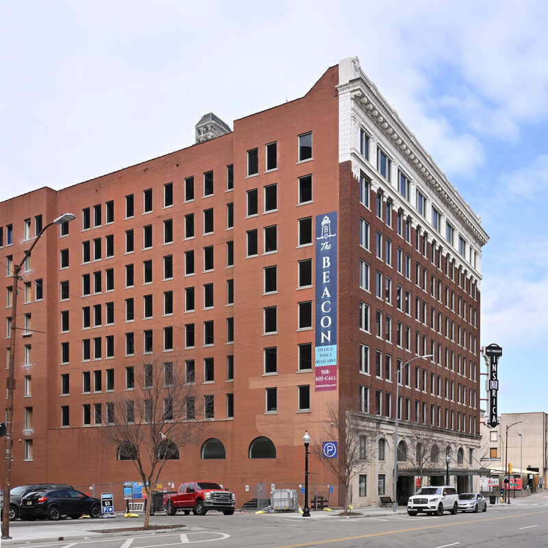 The front and one side of the brick Beacon Building. 124 East 4th Street, Tulsa, Oklahoma 74103.