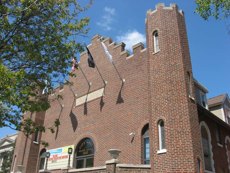 Front of City Hall (formerly the Plymouth Congregational Church, and later the National Guard armory) in Whiting, Indiana, United States.  It was built in 1884.