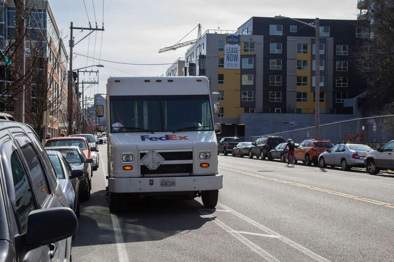 Apparently it's OK to park in the bike lane if you can't find a spot within a few feet of the door.