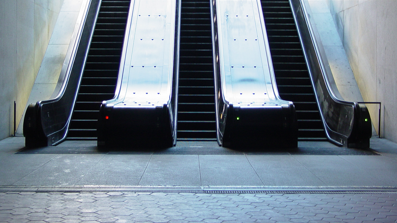 Street escalators at the Maryland Avenue entrance to L'Enfant Plaza, a Metro station in southwest Washington, DC.

Ben Schumin is a professional photographer who captures the intricacies of daily life.  This image may be used under Creative Commons