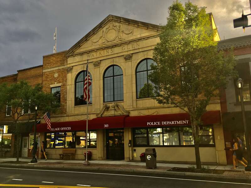 The Watkins Glen Municipal Building at 303 North Franklin Street, Watkins Glen, New York, June 2020. Housing the village government offices and police department, this Colonial Revival-style building was constructed in 1939 as a project of the