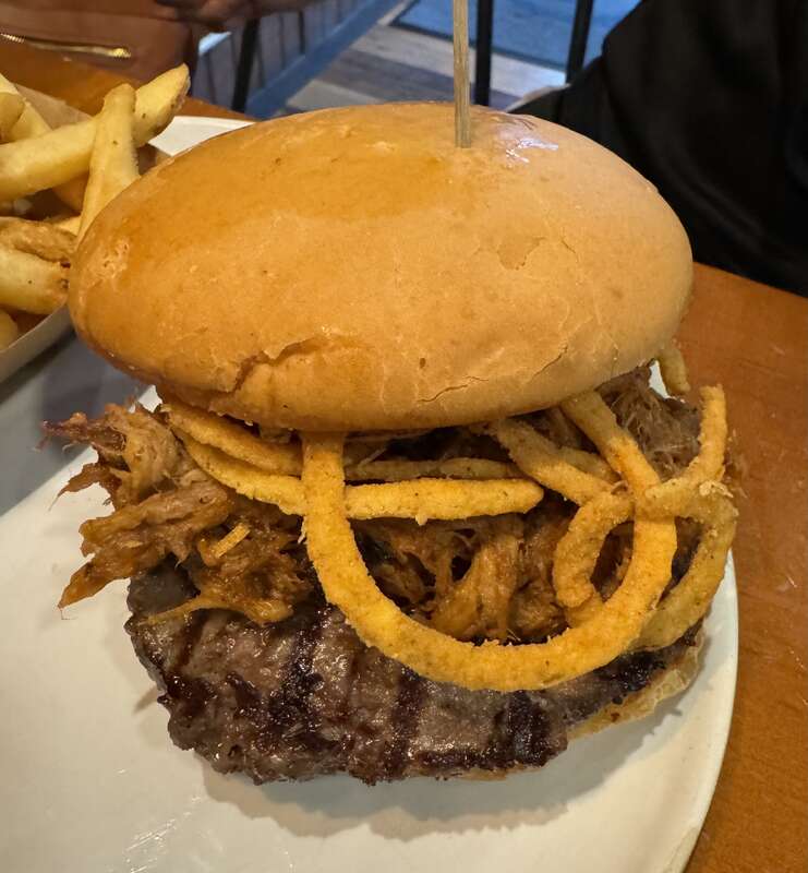 Pulled pork burger with onion rings at Howard's Restaurant, Gatlinburg, Tennessee