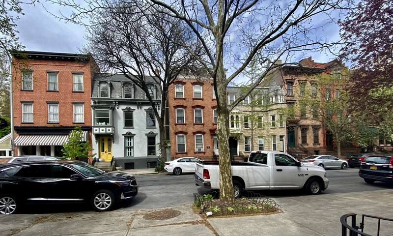 Standing on the north side of State Street just east of its corner with Dove Street, these lovely 19th-century brick row houses are among the contributing properties to Albany's Center Square/Hudson-Park Historic District, listed on the National