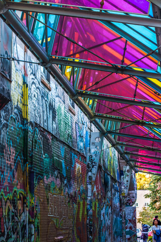 Day 242.
A tunnel of light and color. Shot at as three-image HDR, and then tweaked in Lightroom to bring out the color and light.

Taken Aug 29, 2012 in Cambridge, Massachusetts, United States
¹⁄₁₅ sec at f/4.5, ISO400, no flash.

Lens: EF50mm f/1.4