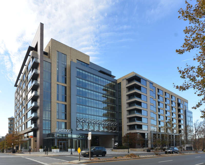 The Flats 8300 apartment bulding from Wisconsin Ave. There is also a Harris Teeter on the Woodmont Avenue side. 8300 Wisconsin Avenue, Bethesda, Maryland 20814.