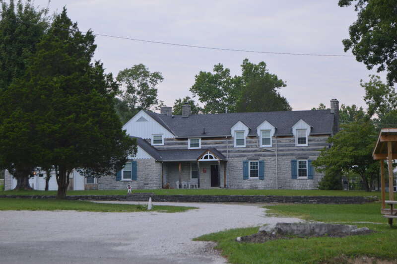 View from the south of part of the John Lair House and Stables complex, located on U.S. Route 25 in Renfro Valley, Kentucky, United States.  The complex is listed on the National Register of Historic Places.