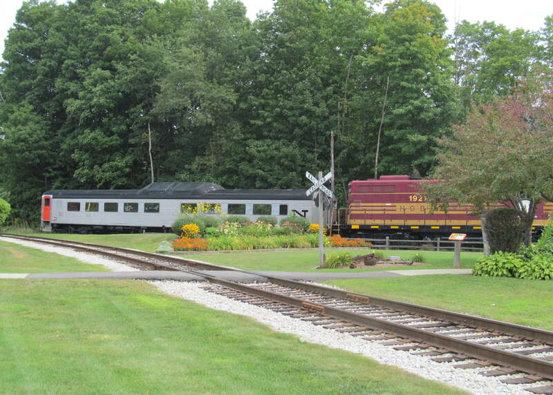 New Haven #162 (a former unpowered car from the Roger Williams) and ex-MBTA GP9 #1921 at the Hobo Railroad in Lincoln, New Hampshire in August 2012