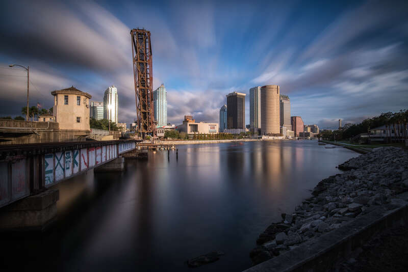 Long exposure photo of the Tampa Florida skyline as seen from Cass Street Bridge.