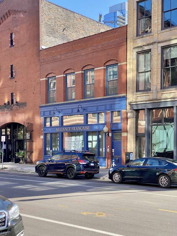 Built in 1883 and 1885, these two brick Italianate-style commercial buildings stand side by side on 1st Street in Minneapolis’s North Loop/Warehouse District.  The building to the south, built in 1885, features a red brick facade with arched second