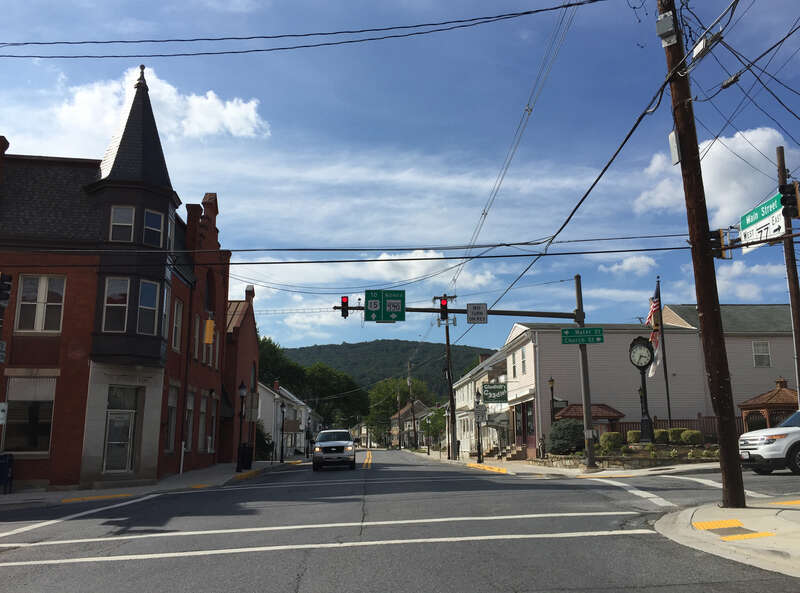 View west along Maryland State Route 77 (Main Street) at Maryland State Route 550 and Maryland State Route 806 (Church Street) in Thurmont, Frederick County, Maryland
