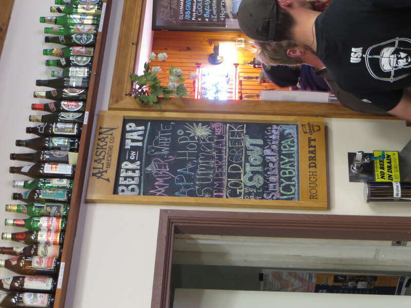 A blackboard listing the ten draft beers available at the taproom of Alaskan Brewing Company in Juneau, Alaska, during my July 2014 visit.
