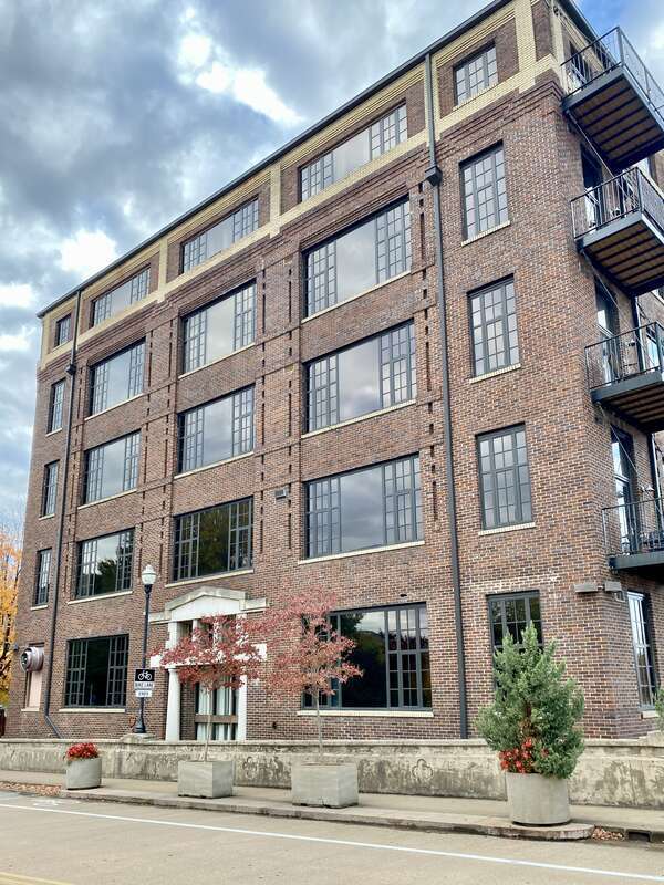 Built circa 1916, this former Candy Factory was built for the South, Littlefield &amp;amp; Steere Company, which operated in the building until 1933.  The building later was utilized as a warehouse for Miller’s Department Store by the mid-1940s, with the