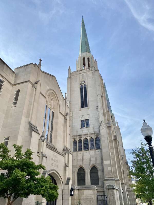 Built in 1926, this Gothic Revival-style building was constructed for the congregation of the First Presbyterian Church of Tulsa, founded in 1885.  The building features a limestone-clad exterior, gothic arched bays, stained glass windows, two towers