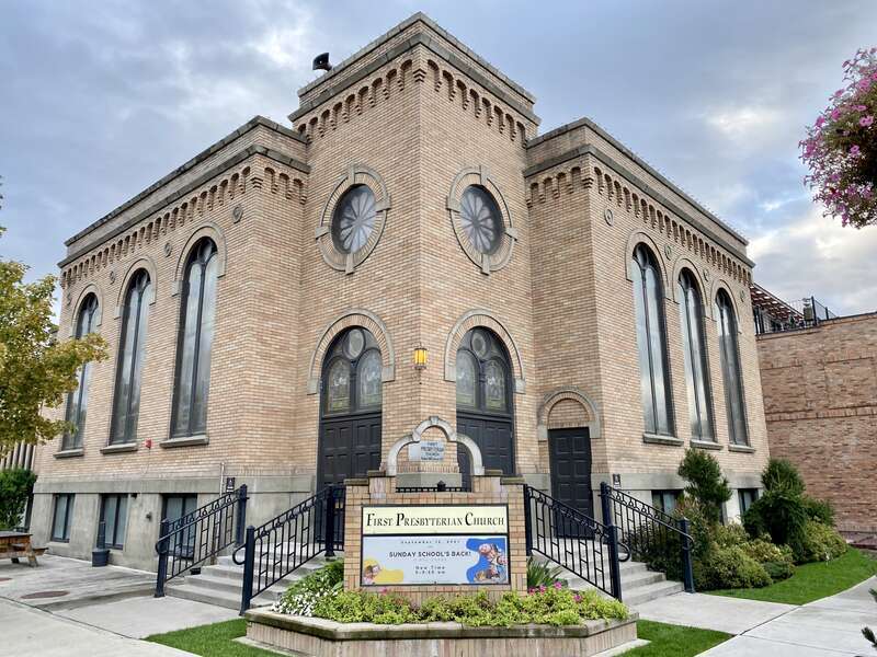 Built in 1921, this stripped and stark Romanesque Revival-style church, home to a Presbyterian congregation, stands at the corner of Central Avenue and 3rd Street in downtown Whitefish, Montana.