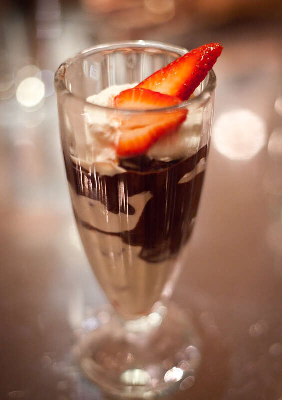 Cookie dough ice cream, california strawberries, chantilly cream, and chocolate sauce. From Ad Hoc in Yountville, CA.