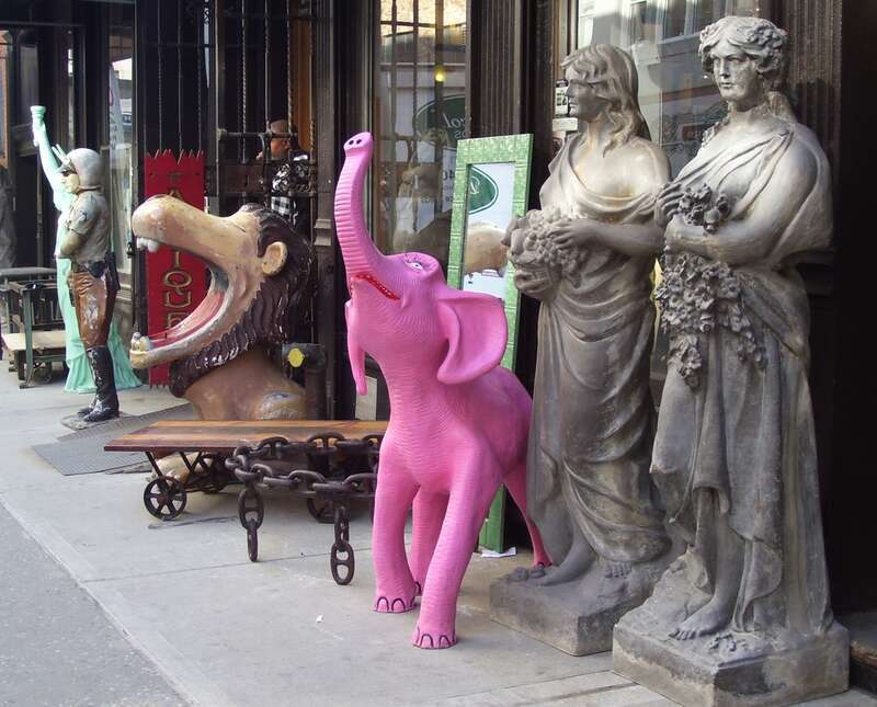 Items from the Olde Good Things store on the sidewalk on West 24th Street between the Avenue of Americas (Sixth Avenue) and Seventh Avenue in the Chelsea neighborhood of Manhattan, New York City.