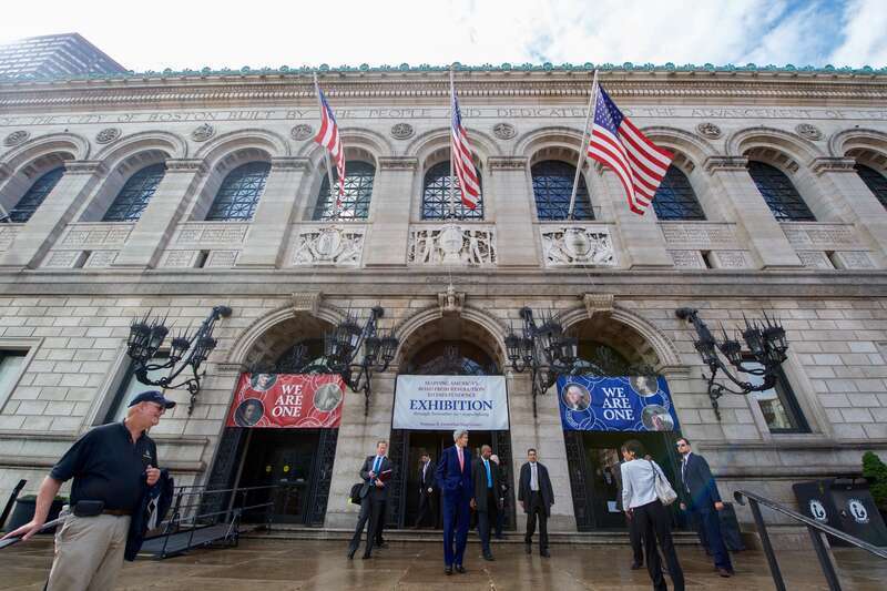 U.S. Secretary of State John Kerry exits the Boston Public Library in Boston, Massachusetts, on October 13, 2015, after he and U.S. Defense Secretary Ash Carter met with their Australian counterparts - Foreign Minister Julie Bishop and Defense