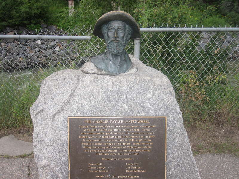 Statue of and plaque describing Charlie Taylor in Idaho Springs, Colorado, taken with Canon camera.