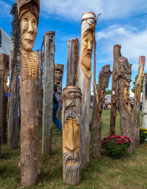 I attended the Common Ground Country Fair in Unity, Maine on Friday.  One of the real joys was to view these wooden face sculptures that are created by Ron Cowan and his son Ryan.  

Ron lives and works in Belfast, Maine, a small mid-coast community