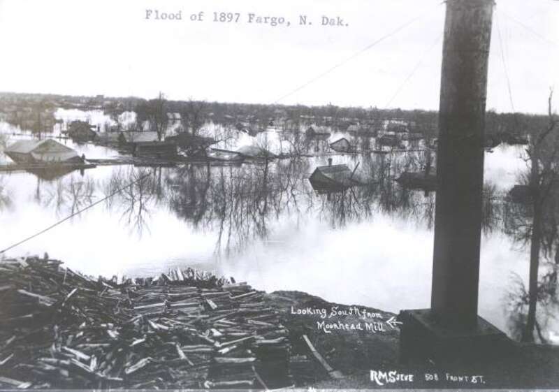 Flooded houses south of the Moorhead Mill, in Moorhead MN.  The damage is from the flood of April 1897.