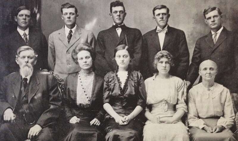 Family photograph. Rear: Herman, Albert, Edward, Carl, Henry Kostboth. Front: Charles, Mame, Katherine, Amelia, and Catherine Kostboth. A copy of this photo is available on page 333 of &quot;Canistota: Our Heritage and History&quot; (1984).