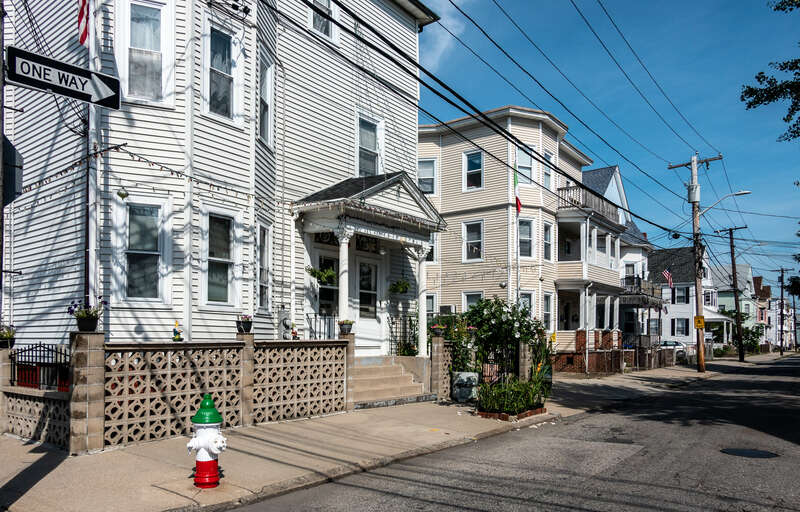 Houses on Federal Hill, Providence Rhode Island. The fire hydrant is painted in the colors of the Italian flag, signifying Federal Hill's heritage as an Italian-American neighborhood.