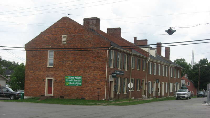 Front and southern end of the Morgan Row, located at 222-232 Chiles Street in Harrodsburg, Kentucky, United States.  Built in 1805 as the oldest group of rowhouses in Kentucky or anywhere else west of the Appalachian Mountains, the row is listed on