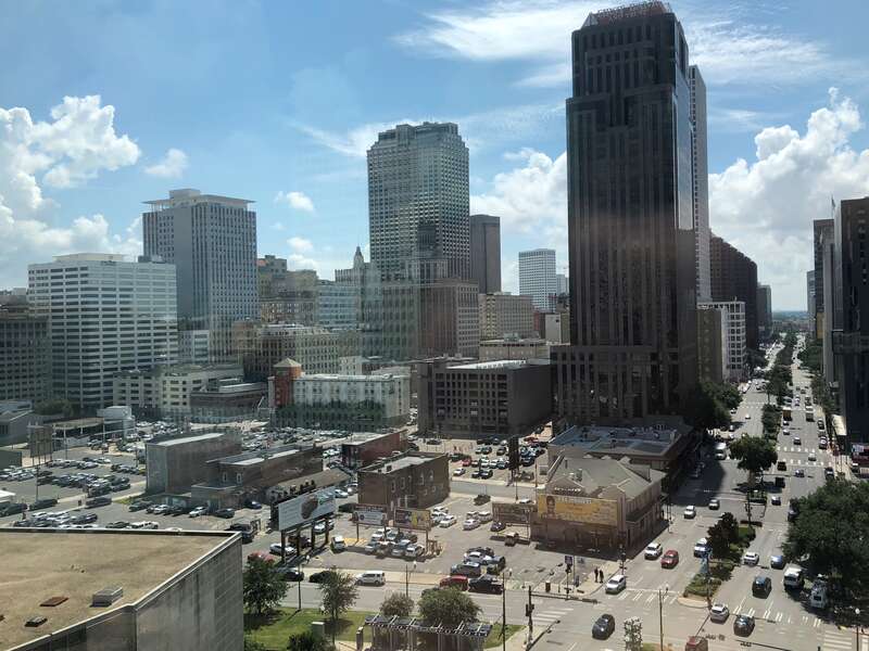 Aerial view over the Poydras Street / Loyola Avenue intersection in downtown New Orleans, Louisiana.The lowhouse with yellow posterboard is The Little Gem Saloon.