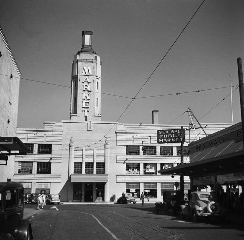 The Portland Public Market, in Portland, Oregon.  The building was completed in 1933 and was located along Front Street (later named Front Avenue, and now Naito Parkway), with its back being along the Willamette River &quot;sea wall&quot;. The market closed in