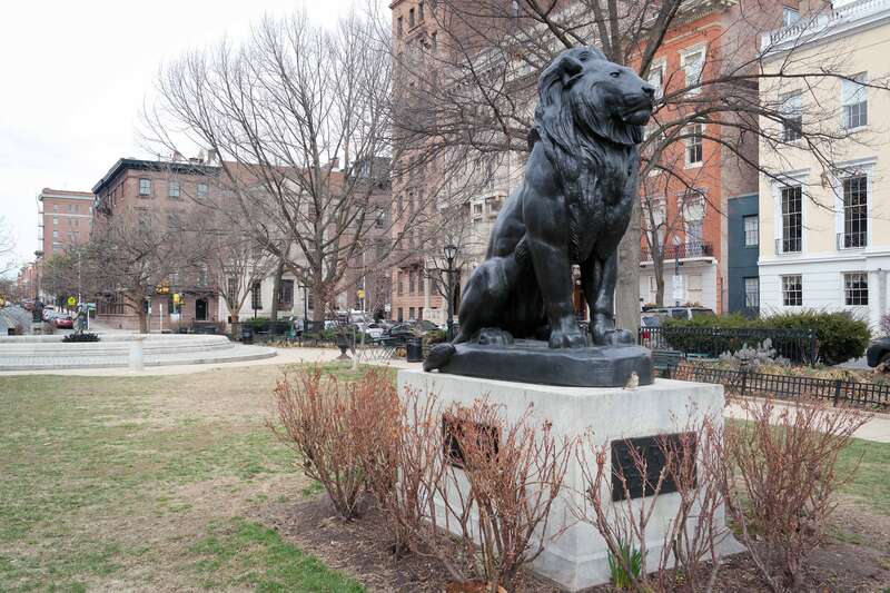 A view of Antoine-Louis Barye's Seated Lion replica in the Mount Vernon Place Historic District of Baltimore