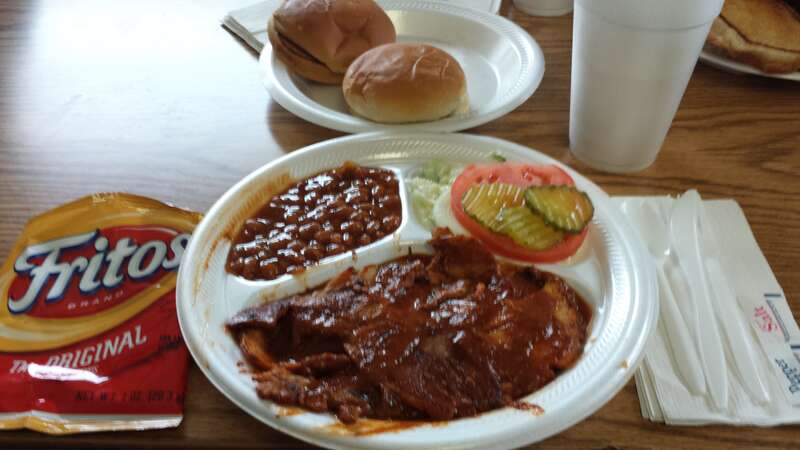 BBQ pork with hot sauce BBQ sauce, baked beans, coleslaw under sandwich fixins, Craig's BBQ, DeValls Bluff, AR