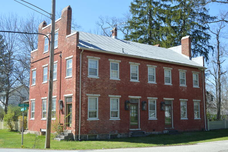 Front and southern side of the house located on the northwestern corner of Main (State Route 72) and Water Streets in Clifton, Ohio, United States.