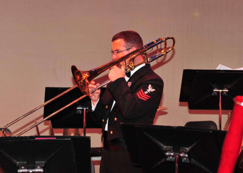 100321-N-2257C-003 SUMTER, S.C. (March 21, 2010) At the Patriot Hall Performing Arts Center in Sumter, S.C., US Navy Band member Musician 1st Class Colin Wise prepares for the trombone section's technical passage in Henry Fillmore's march, &quot;Rolling