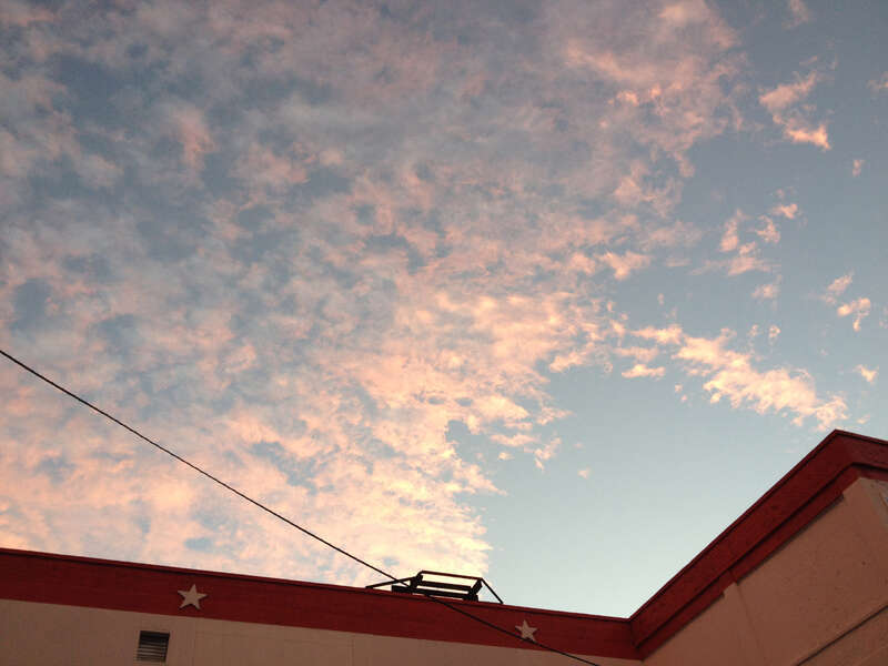 Cloud formations reflecting the sunset after a partly raining partly sunny day, taken while facing east in the parking lot of the American Self-Storage facility at 190 Baldwin Avenue in Jersey City, New Jersey.

This photo was created by Luigi Novi.