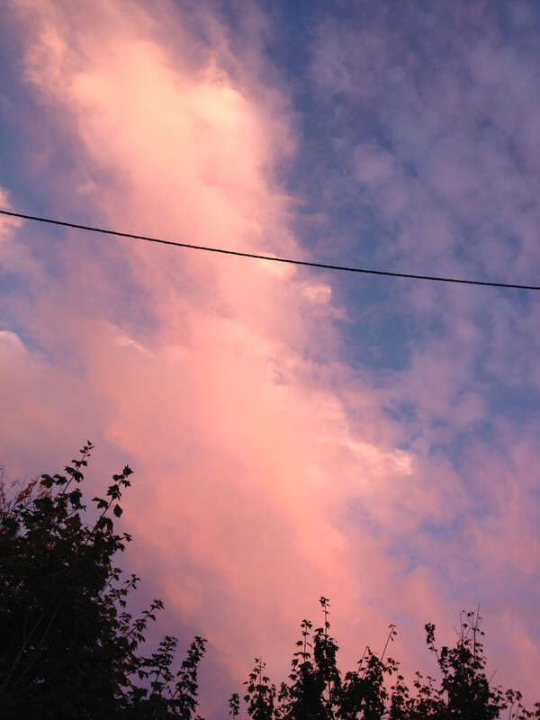Cloud formations reflecting the sunset after a partly raining partly sunny day, taken while facing east in the parking lot of the American Self-Storage facility at 190 Baldwin Avenue in Jersey City, New Jersey.

This photo was created by Luigi Novi.