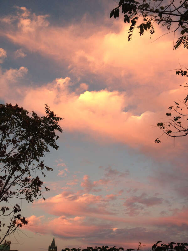 Cloud formations reflecting the sunset after a partly raining partly sunny day, taken while facing east in the parking lot of the American Self-Storage facility at 190 Baldwin Avenue in Jersey City, New Jersey.

This photo was created by Luigi Novi.