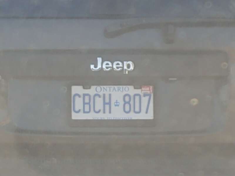 A 1997-2020 style Ontario license plate, CBCH♔807 on a 2010 Jeep Liberty photographed in Las Vegas, Nevada.